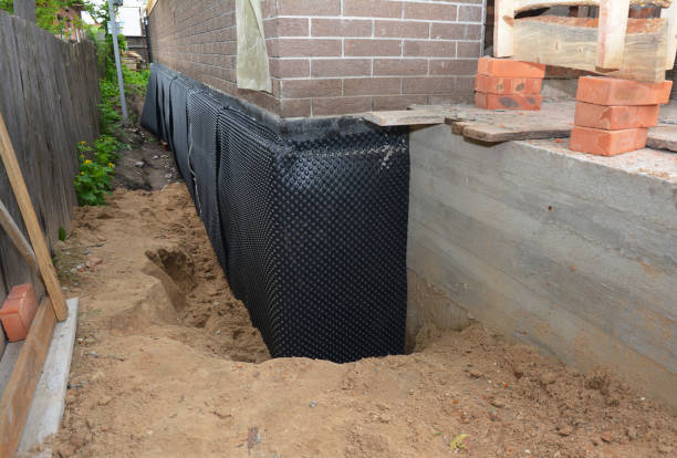 Happy homeowners after waterproofing job in Millersburg